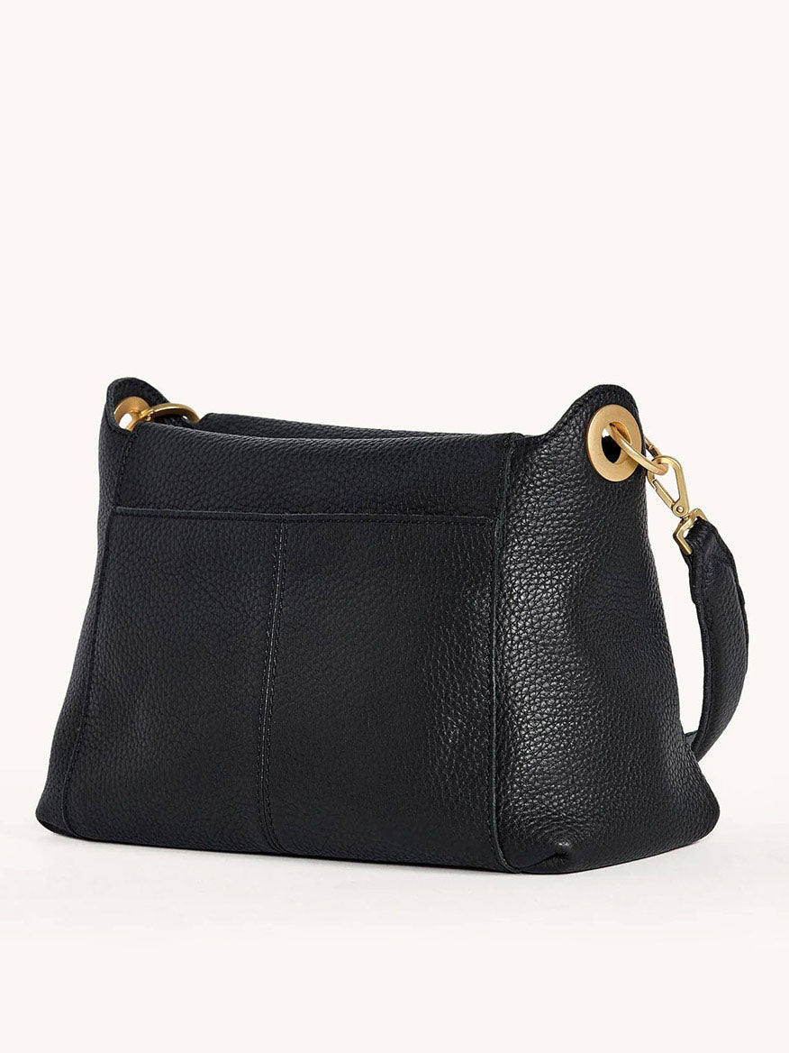 The Hammitt Los Angeles Bryant Medium Crossbody Bag in Black boasts a textured pebbled leather finish with gold grommet accents and a black strap, perfect for everyday effortless style.