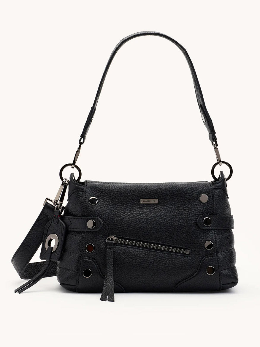The Hammitt Los Angeles Bryant Medium Crossbody Bag in Moto Black/Gunmetal features a top handle, side rings, decorative lacing, metal accents, and a detachable tag—an effortlessly versatile black leather bag perfect for day-to-night wear.
