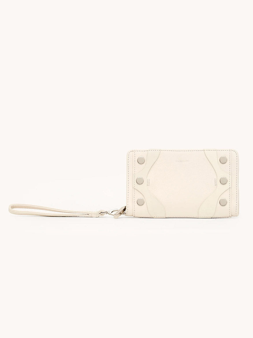 The Hammitt Los Angeles Bryant Wallet in Western Rein/Silver, crafted from pebble leather with silver accents, features button details, a rectangular shape, and a detachable wristlet strap, displayed on a plain background.