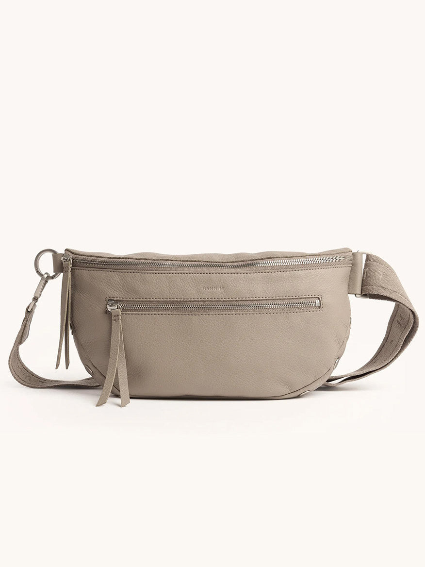The Hammitt Los Angeles Charles Crossbody Large in Pewter Pebble/Brushed Silver features a front zip pocket, top zip closure, and adjustable strap; it's versatile enough to style as a fanny pack and is shown against a plain background.