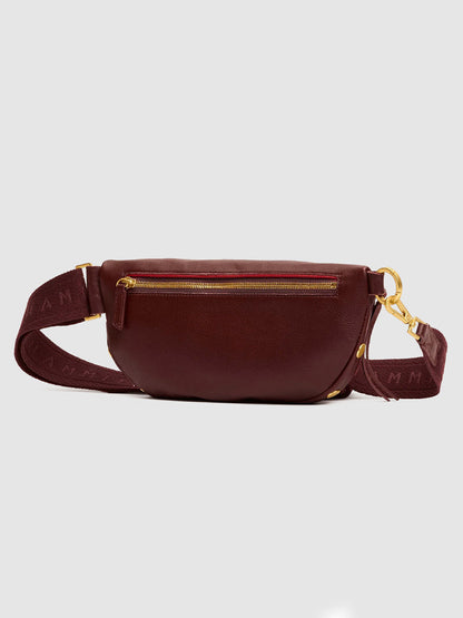 Hammitt Los Angeles Charles Crossbody Medium in Cherrywood Pebble/Brushed Gold, featuring pebble leather in a maroon hue, brushed gold zipper and hardware, and an adjustable strap with subtle text.