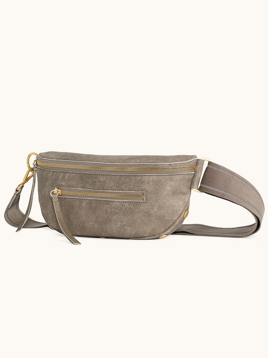 The Hammitt Los Angeles Charles Crossbody Medium in Pewter Brushed Nubuck/Brushed Gold features a front zipper pocket, gold hardware, and an adjustable strap, and is displayed on a plain light background.