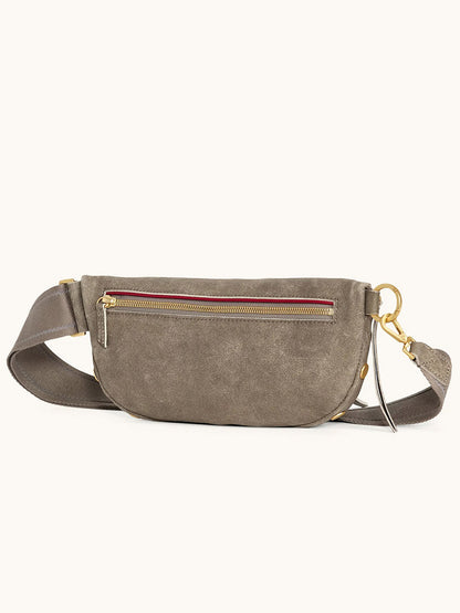 The Hammitt Los Angeles Charles Crossbody Medium in Pewter Brushed Nubuck/Brushed Gold features an adjustable strap, gold-tone zipper and hardware, and a front zip pocket, shown against a plain background.