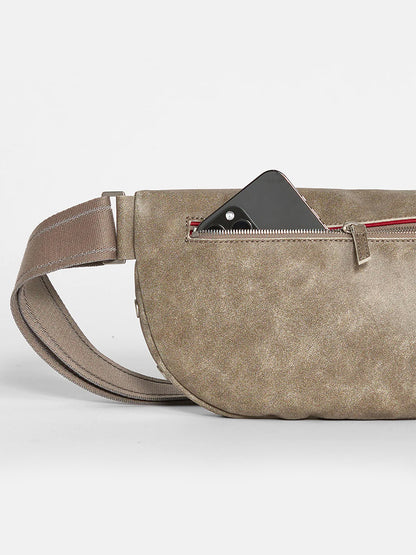 A Hammitt Los Angeles Charles Crossbody Large in Pewter with a red leather zipper pull and an adjustable brown strap, displayed on a light gray background.