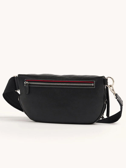 The Hammitt Los Angeles Charles Crossbody Large in Tempo Black is a stylish pebbled leather bag with a zippered front pocket and an adjustable strap, elegantly displayed against a plain background.