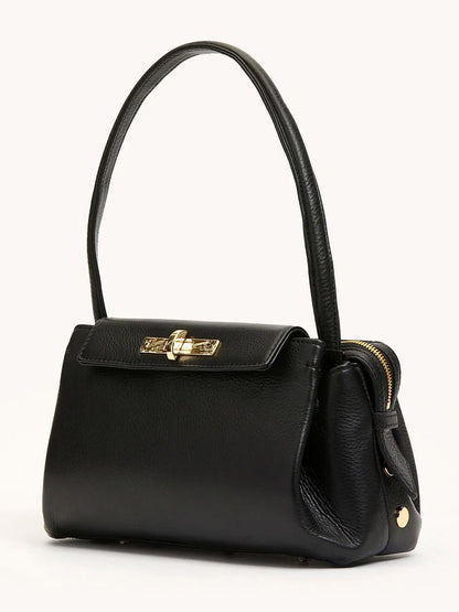 The Hammitt Los Angeles Charlotte Medium in Black/Gold is a black pebble leather handbag with a single top handle, gold-tone hardware, and a flap closure, offering large capacity and stylish functionality for everyday use.