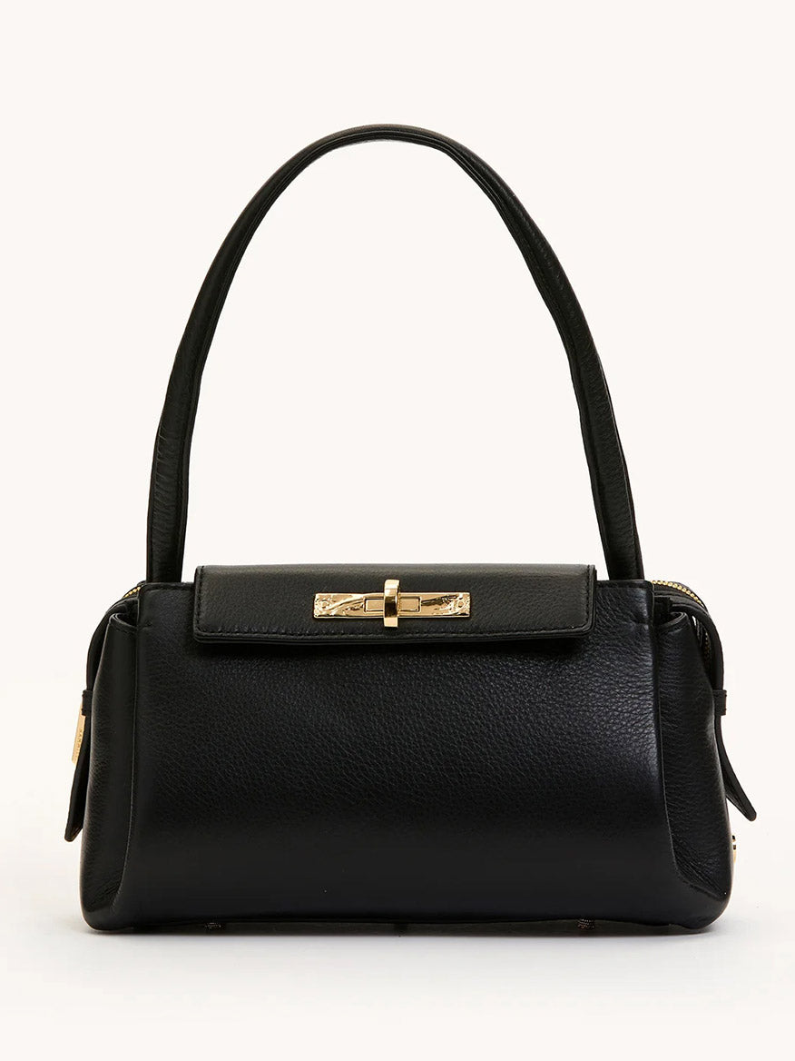 The Hammitt Los Angeles Charlotte Medium in Black/Brushed Gold features black pebble leather, gold hardware, a top handle, and a roomy rectangular shape. Stylish and spacious, it's photographed against a plain light background.