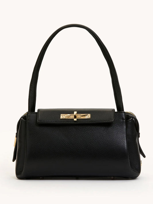 The Hammitt Los Angeles Charlotte Medium in Black/Brushed Gold features black pebble leather, gold hardware, a top handle, and a roomy rectangular shape. Stylish and spacious, it's photographed against a plain light background.