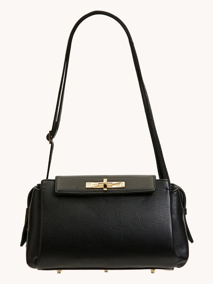 The Hammitt Los Angeles Charlotte Medium in Black/Brushed Gold features black pebble leather, a long shoulder strap, gold-tone clasp, and a structured rectangular shape—a chic crossbody with ample space for essentials.