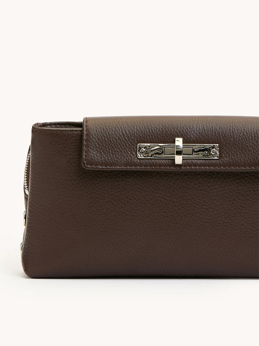 A close-up of the Hammitt Los Angeles Charlotte Small evening clutch in Espresso Pebble leather with a silver clasp, set against a plain light background.