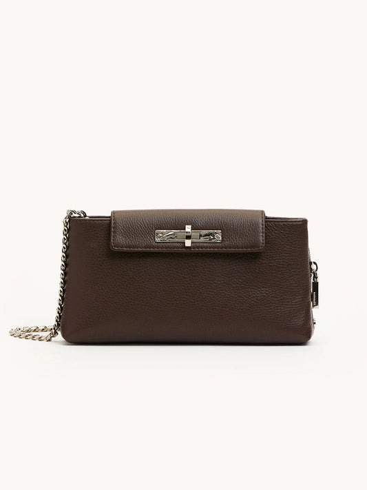 The Hammitt Los Angeles Charlotte Small in Espresso Pebble/Silver is a rectangular dark brown leather evening clutch featuring a flap closure, metal clasp, and silver chain strap, set against a plain light background.