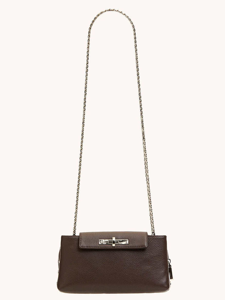 The Hammitt Los Angeles Charlotte Small in Espresso Pebble/Silver is a brown leather crossbody bag with a long metal chain strap and a rectangular silver clasp on the front flap, shown against a plain background.