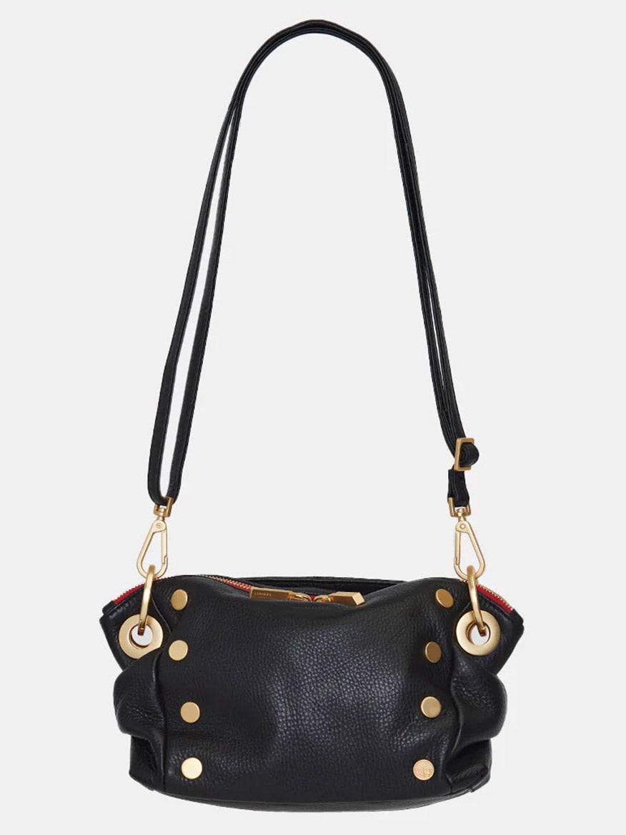 The Hammitt Los Angeles Daniel Crossbody Clutch Small in Black & Brushed Gold is a chic handbag with gold studs and a versatile crossbody strap for easy carrying.