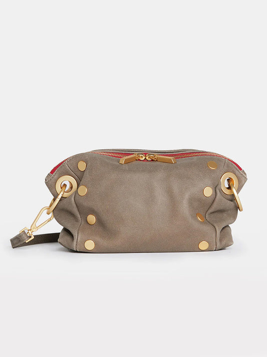 A Hammitt Los Angeles Daniel Crossbody Clutch Small in Pewter with gold metal accents, a red zipper, and a removable strap for versatile use as a crossbody bag.