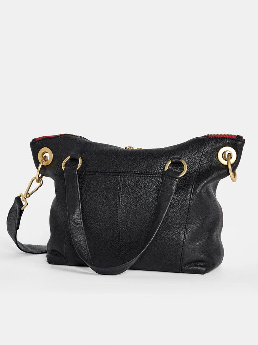 A Hammitt Los Angeles Daniel Medium Satchel in black with brushed gold hardware and a red zip, featuring two top handles and an adjustable crossbody strap, displayed against a plain white background.