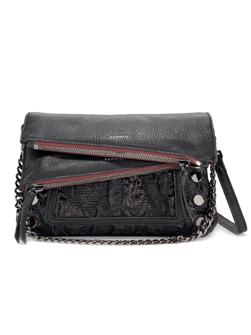 The Hammitt Los Angeles Dillon Small in Midnight Marquise/Gunmetal is a black Italian leather handbag with a textured flap, silver chain strap, exposed zippers, and gunmetal grommet details—an edgy yet sophisticated accessory for any occasion.