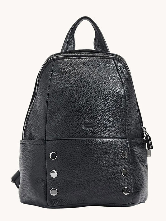 The Hammitt Los Angeles Hunter Medium Backpack in Black/Gunmetal features black pebbled leather, a top handle, adjustable straps, front zipper pocket, and four vertical gunmetal studs—perfect as a stylish day backpack.