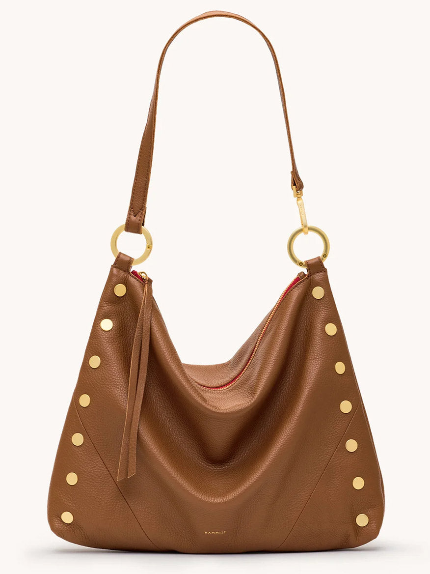 Meet the Hammitt Los Angeles Kyle Large Shoulder Bag in Mahogany Pebble, finished with brushed gold-tone studs, gold rings on the strap, and a standout red zipper closure.