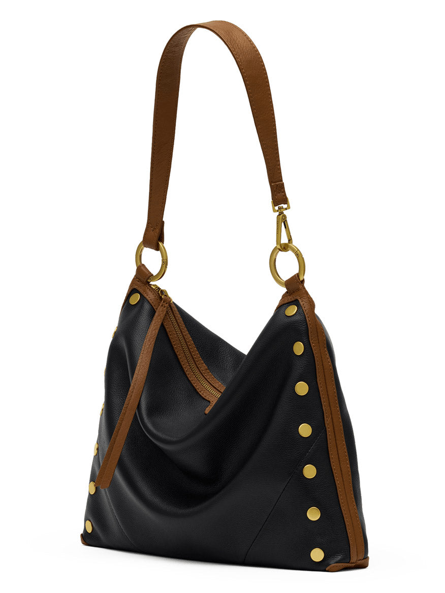 Hammitt Los Angeles Kyle Large Shoulder Bag in East End/Antique Gold, featuring black pebbled leather, a brown leather strap, gold stud accents, and gold hardware. The bag is displayed at an angle with its zipper visible against a white background.