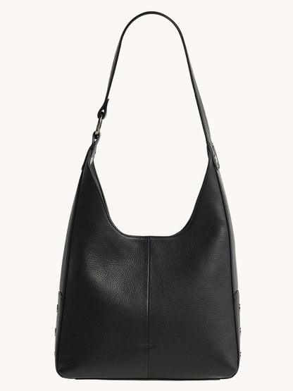 The Hammitt Los Angeles Tim Hobo in Black features black pebbled leather, a single strap, minimal stitching, a smooth structured shape, and a secure magnetic closure against a plain background.