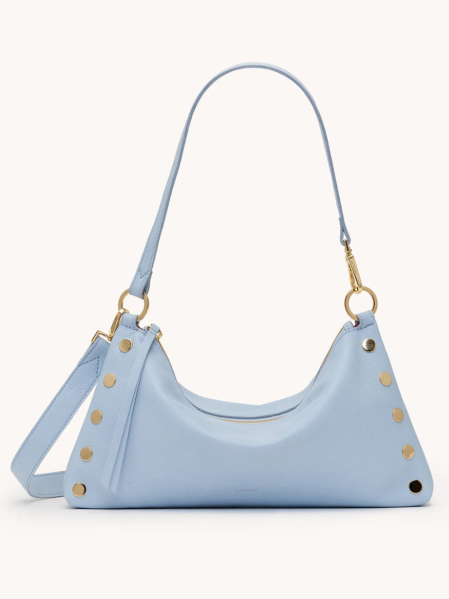 Hammitt Los Angeles Kyle Medium Shoulder Bag in Hazy Blue/Gold features pebbled leather, gold rivet accents, a zipper closure, and an adjustable strap, displayed against a plain background.