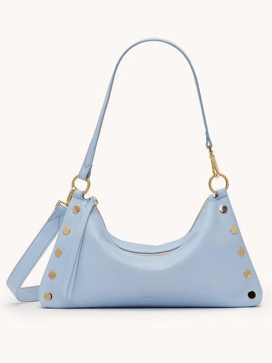 Hammitt Los Angeles Kyle Medium Shoulder Bag in Hazy Blue/Gold features pebbled leather, gold rivet accents, a zipper closure, and an adjustable strap, displayed against a plain background.