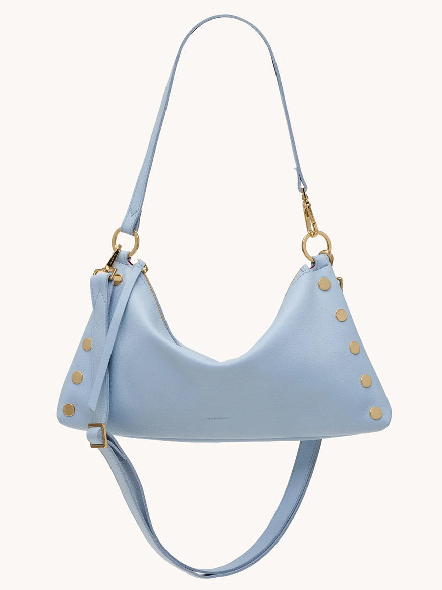 The Hammitt Los Angeles Kyle Medium Shoulder Bag in Hazy Blue/Gold features pebbled leather, gold hardware and studs, plus a long adjustable strap.