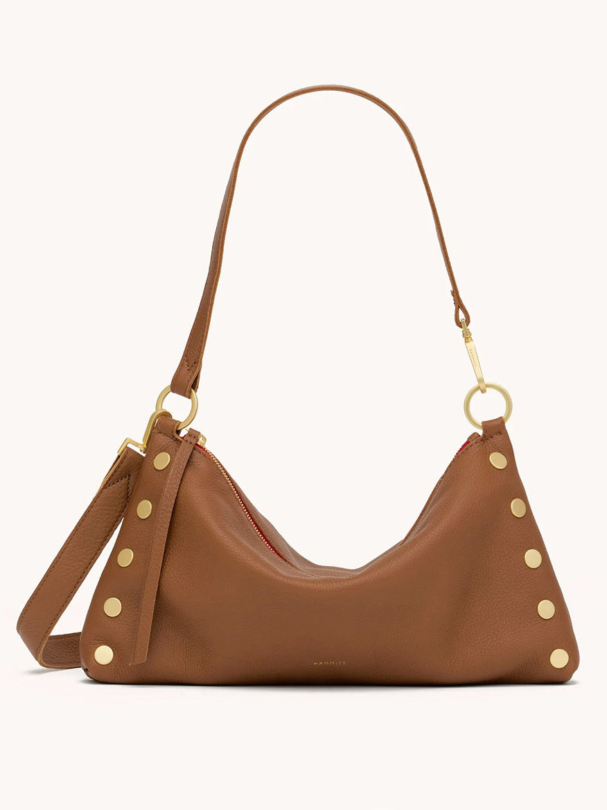 The Hammitt Los Angeles Kyle Medium Shoulder Bag in Mahogany Pebble/Brushed Gold & Red Zip features gold hardware, side studs, and an adjustable strap, shown against a plain background.