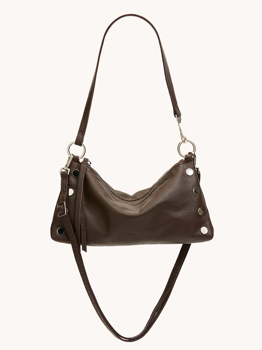 The Hammitt Los Angeles Kyle Shoulder Bag in Espresso Pebble/Silver features silver grommet details, a zipper closure, and an adjustable crossbody strap, displayed against a plain background.