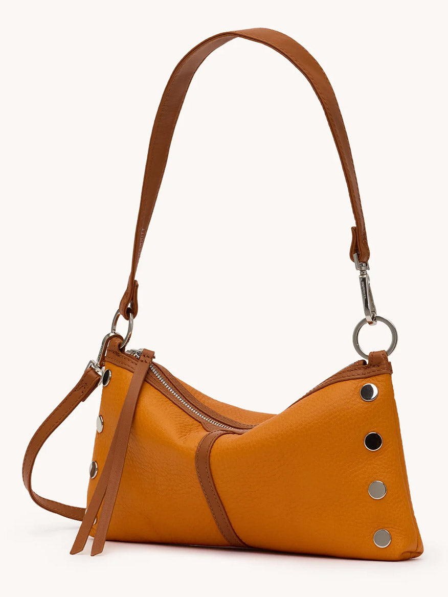 The Hammitt Los Angeles Kyle Shoulder Bag in Tailored Tangerine/Silver features a brown strap, side zipper, and silver rivet accents, displayed on a plain background.