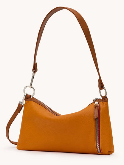 The Hammitt Los Angeles Kyle Shoulder Bag in Tailored Tangerine/Silver is a compact orange leather bag with a single strap, silver hardware, and a front diagonal zipper—ideal as a stylish crossbody for everyday essentials.