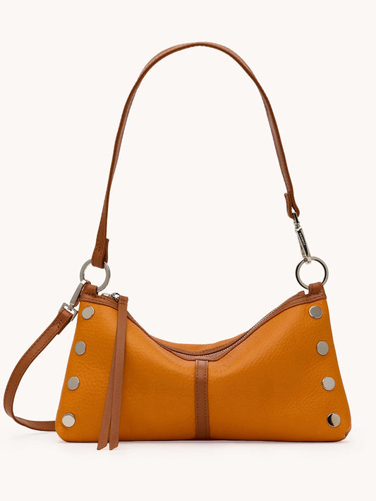 The Hammitt Los Angeles Kyle Shoulder Bag in Tailored Tangerine/Silver features silver studs, a top zipper, and an adjustable strap. This versatile crossbody is pictured against a plain light background.
