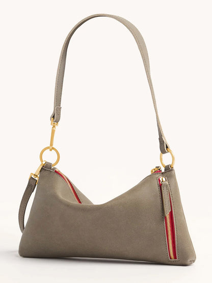 Hammitt Los Angeles Kyle Shoulder Bag in Pewter with brushed gold hardware and red zip accents, featuring a short shoulder strap, displayed against a neutral background.