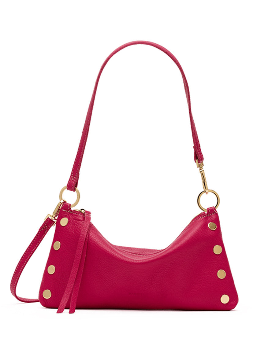 The Hammitt Los Angeles Kyle Shoulder Bag in Calypso Pebble/Gold is a compact, vibrant pink crossbody crafted from fuchsia pebbled leather, featuring a single strap, gold hardware, round gold studs along the sides, and a secure zipper closure.