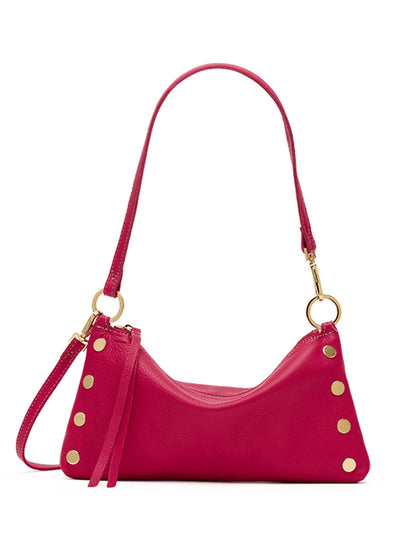 The Hammitt Los Angeles Kyle Shoulder Bag in Calypso Pebble/Gold is a compact, vibrant pink crossbody crafted from fuchsia pebbled leather, featuring a single strap, gold hardware, round gold studs along the sides, and a secure zipper closure.