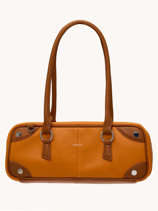 The Hammitt Los Angeles Meredith Small in Tailored Tangerine/Silver features pebbled orange leather, double shoulder straps, silver corner accents, and a subtle brand logo for a chic, structured look.