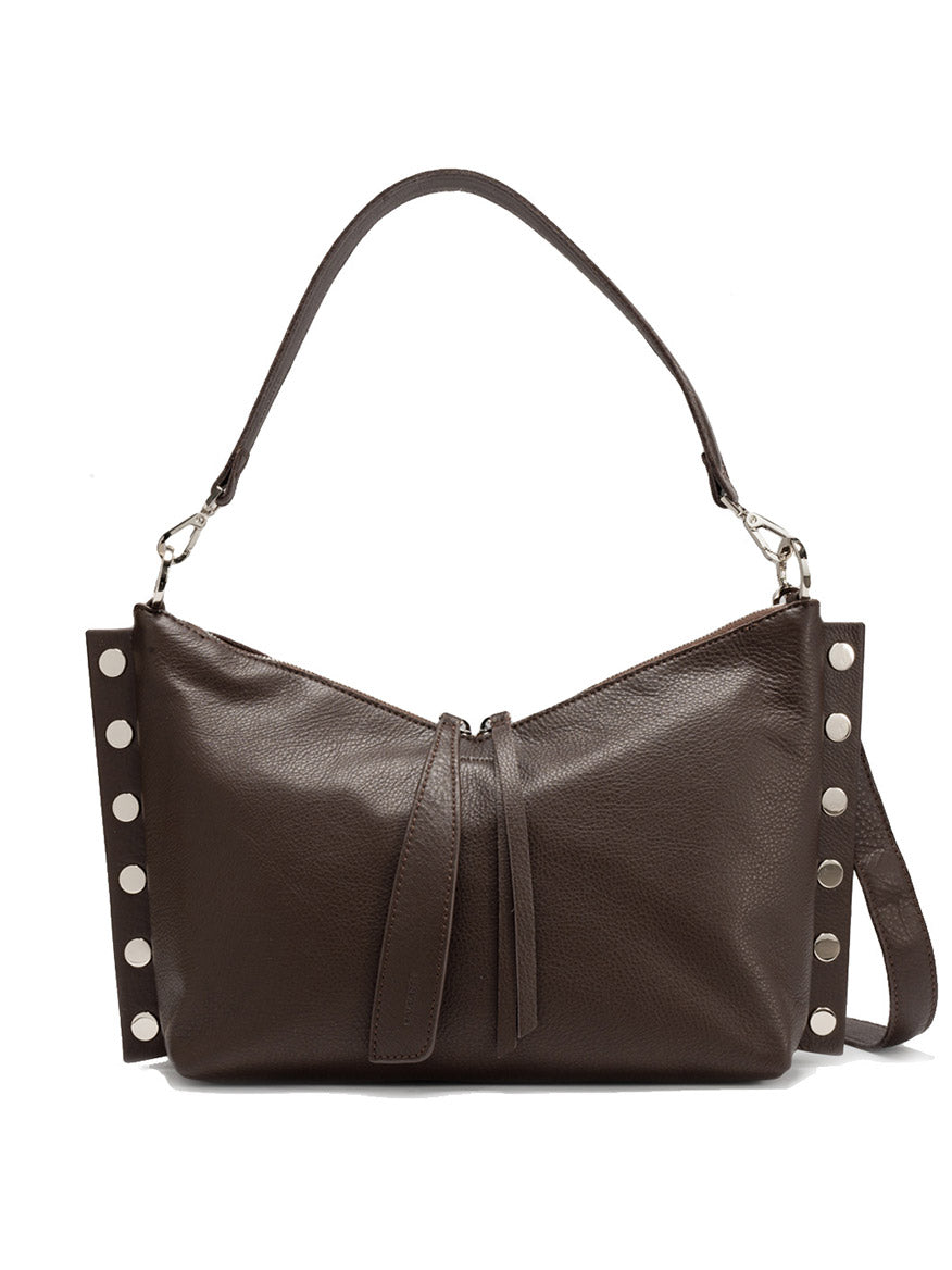 The Hammitt Los Angeles Mr. G Medium in Espresso Pebble/Silver is a chic dark brown leather bag with a single shoulder strap, side silver studs, and a zip closure with twin leather tassels—ideal for everyday use.