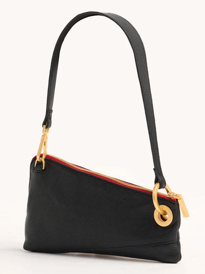 The Hammitt Los Angeles Nash Pochette in Black/Brushed Gold & Red Zip is a handbag made of black pebbled leather, featuring gold-tone hardware, a red zipper, and a versatile detachable J-hook strap.