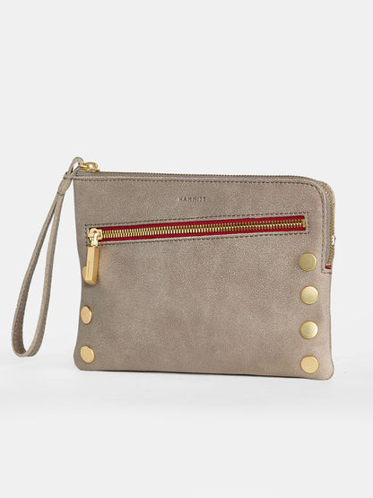 A stylish Hammitt Los Angeles Nash Small Clutch in Pewter featuring a striking design with a front zippered pocket, pewter color detailing, luxurious gold hardware, decorative gold studs, and a convertible strap for versatile wear.