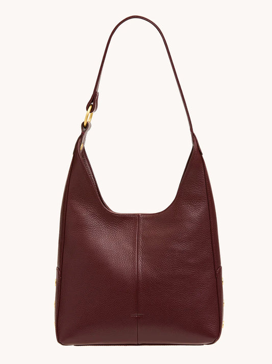 The Hammitt Los Angeles Tim Med Hobo in Cherrywood Pebble features a single strap, brushed gold hardware, and a structured design, showcased against a plain background.