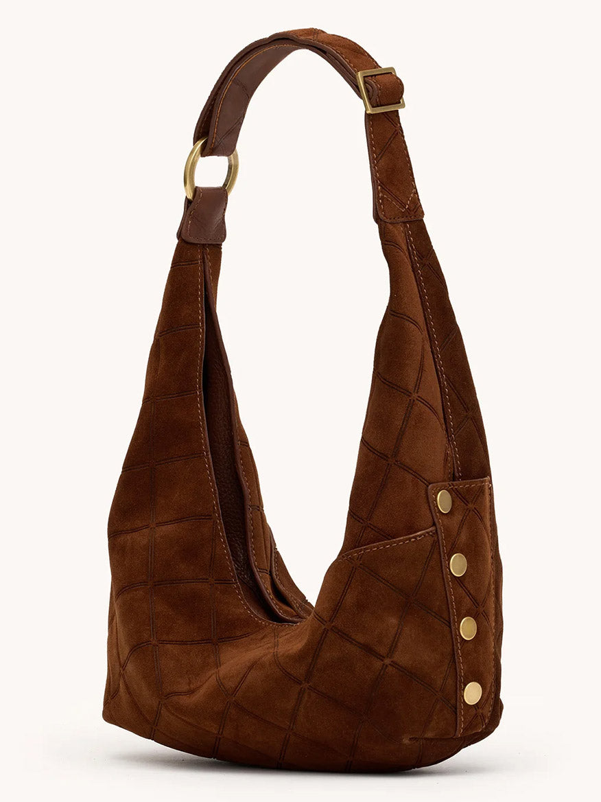 The Hammitt Los Angeles Tom Zip Medium in Chocolate Diamond Suede/Antique Gold features a quilted pattern, gold side buttons, and an adjustable shoulder strap with a gold buckle, displayed against a plain background.