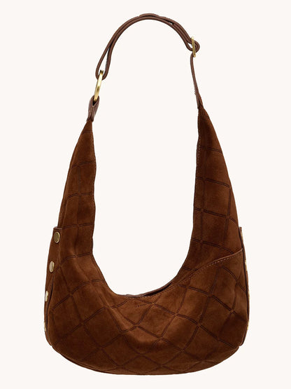 The Hammitt Los Angeles Tom Zip Medium in Chocolate Diamond Suede/Antique Gold is a brown Italian suede hobo bag featuring a quilted pattern, short strap, and antique gold snap button accents on the side.