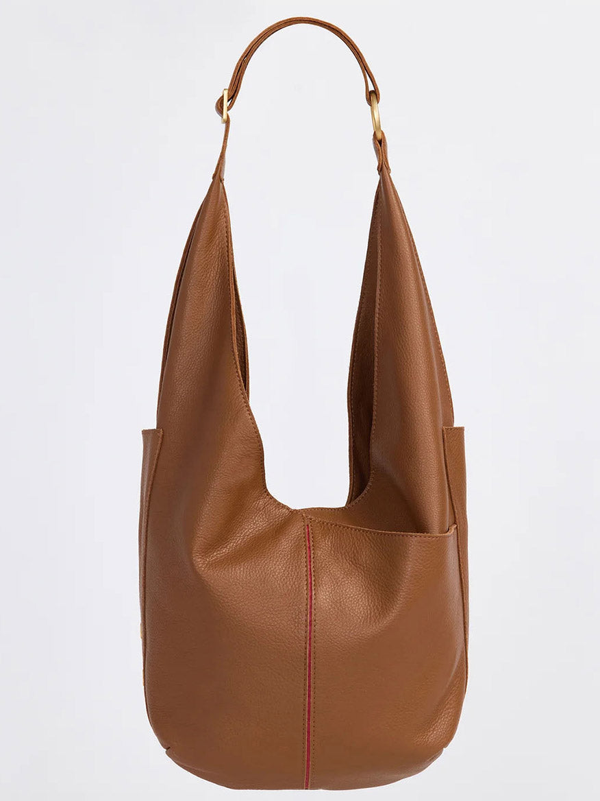 The Hammitt Los Angeles Tom Zip in Mahogany Pebble is a brown pebbled leather tote bag featuring an adjustable wide strap and a visible seam down the front.