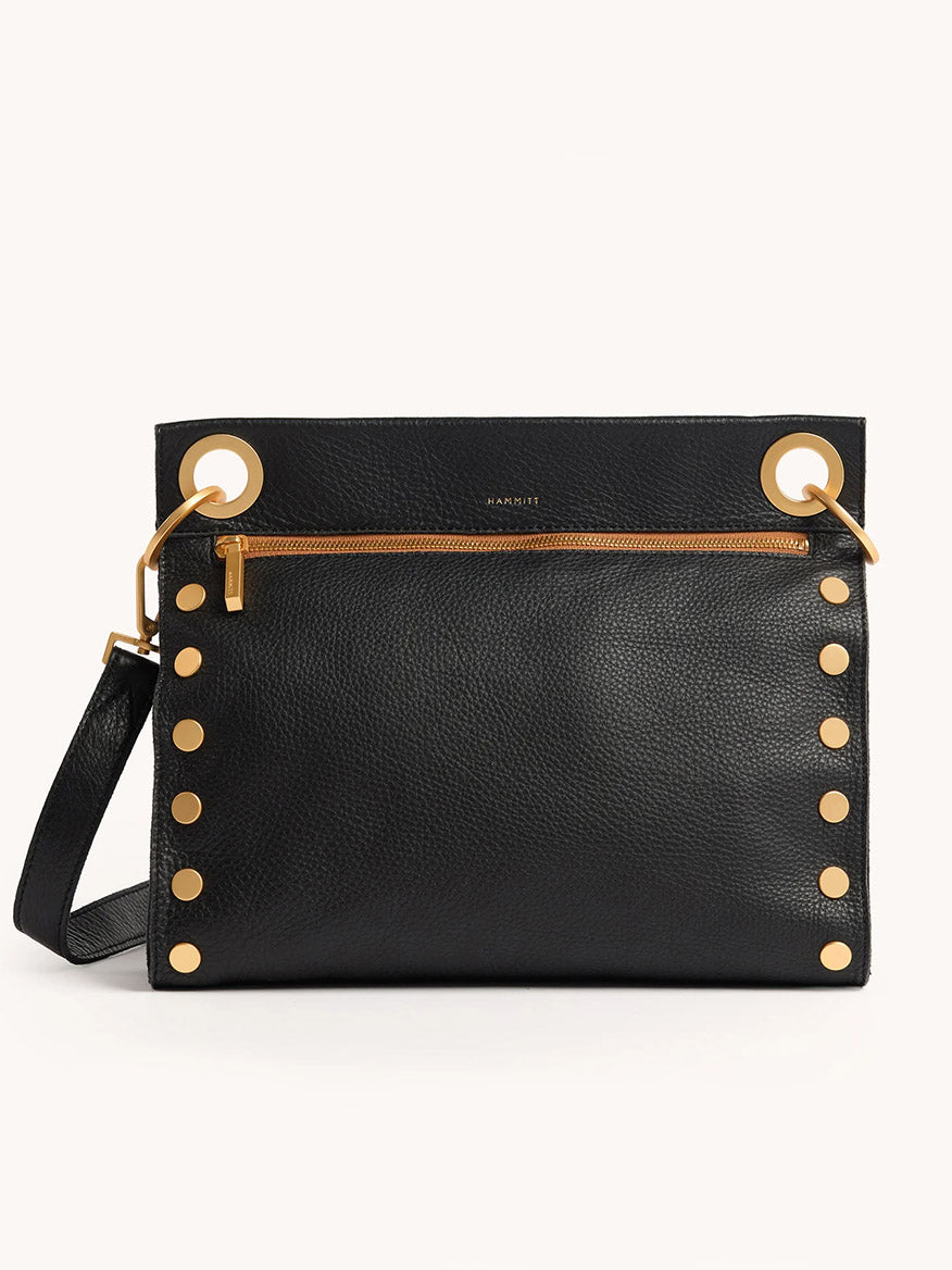 The Hammitt Los Angeles Tony Large Crossbody Bag in North End is a sleek black leather bag with a gold zipper, gold rivet accents, and an adjustable strap for effortless style and comfort.