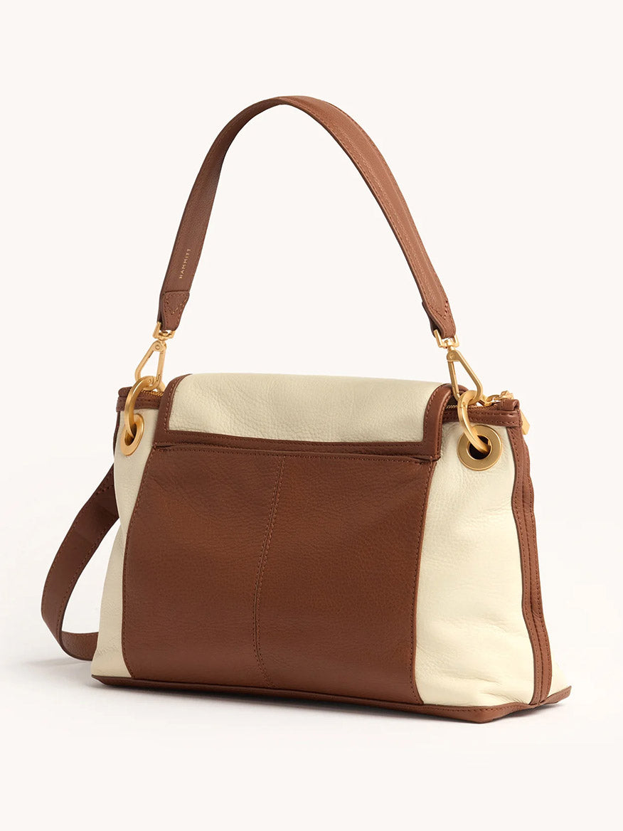 The Hammitt Los Angeles VIP Grand in Courtyard Cream features brown and cream leather panels, gold hardware, a top handle, and a detachable strap—showcasing classic Hammitt style against a plain light background.