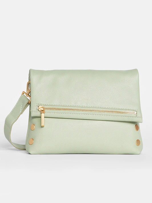Hammitt Los Angeles VIP Medium Clutch in Cypress Sage with a fold-over top, front zipper, and detachable strap, displayed against a neutral background.