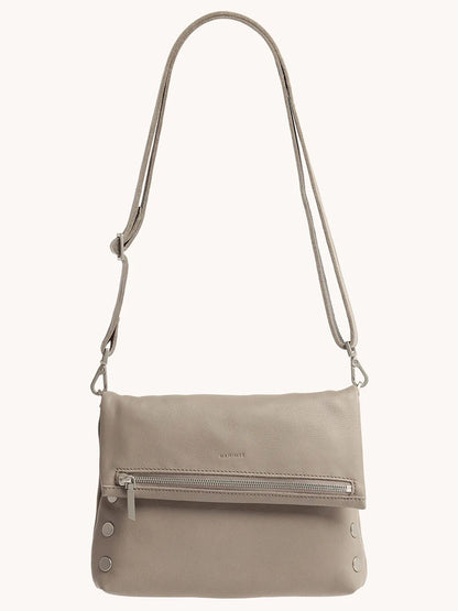 The Hammitt Los Angeles VIP Medium Clutch in Pewter Pebble features a front zipper pocket, silver-tone hardware, and an adjustable, removable crossbody strap.