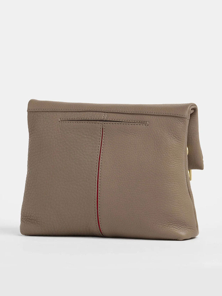 Displayed elegantly against a plain background, the Hammitt Los Angeles VIP Medium Clutch in Sculpted Taupe features striking red center stitching detail.