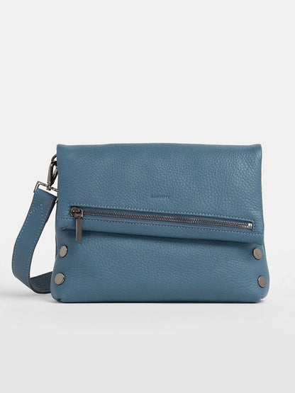 Check out the Hammitt Los Angeles VIP Medium Clutch in Curated Blue, boasting a zippered front pocket, snap button accents, and a removable crossbody strap to easily transform into a stylish clutch for special events.