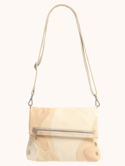 The Hammitt Los Angeles VIP Medium Clutch in Coastal Cream is a beige leather crossbody bag with abstract patterns. It features a front zipper pocket and an adjustable, removable strap for versatility, perfect for those seeking a touch of elegance.